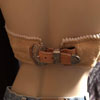 Lady's leather bra sporting Keith valleys' Sheridan Style Floral Carving with a unique use of non-traditional orchid flowers